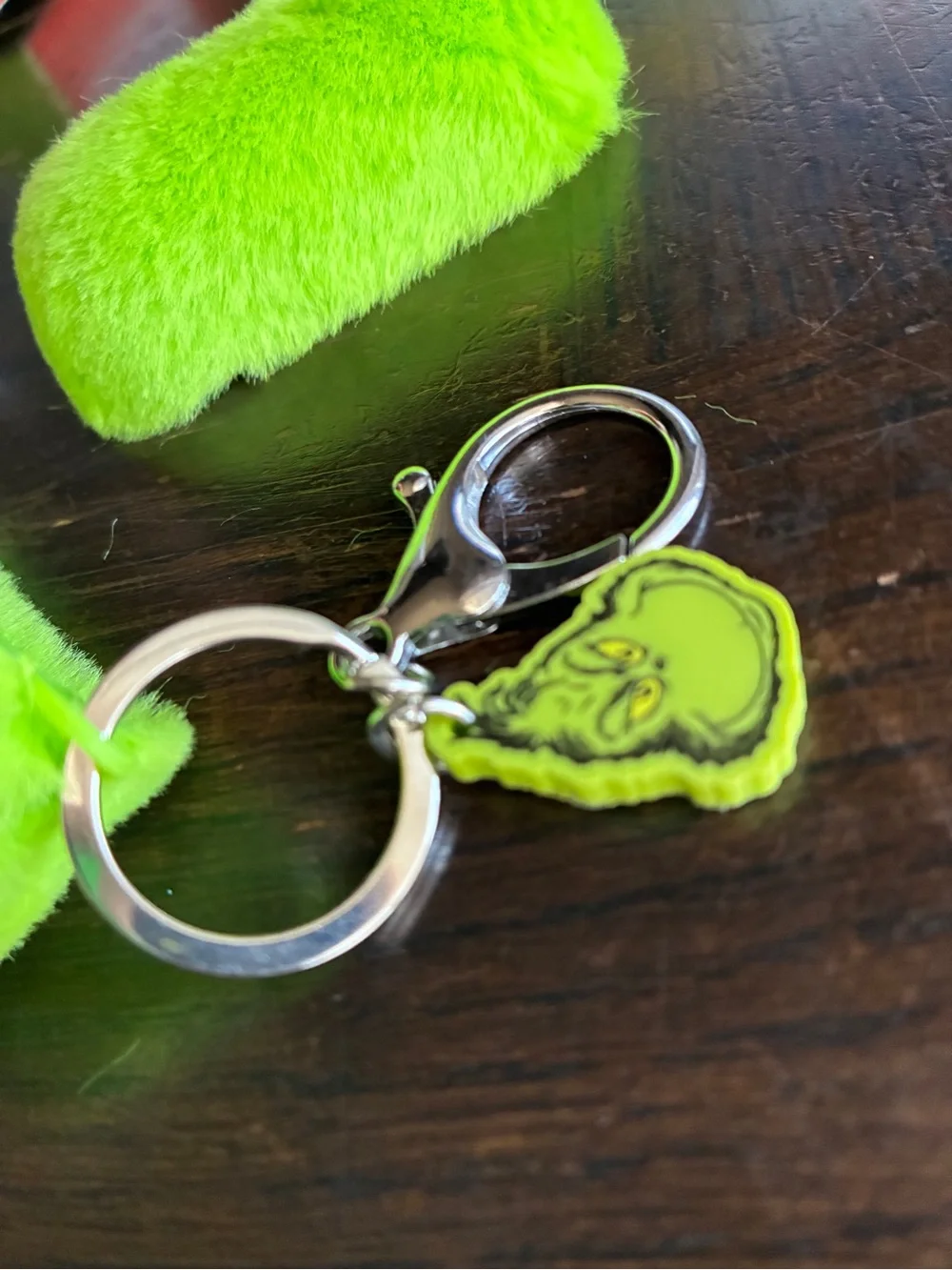The Grinch Plush AirPods Pro Case in Bright Green with Keyring